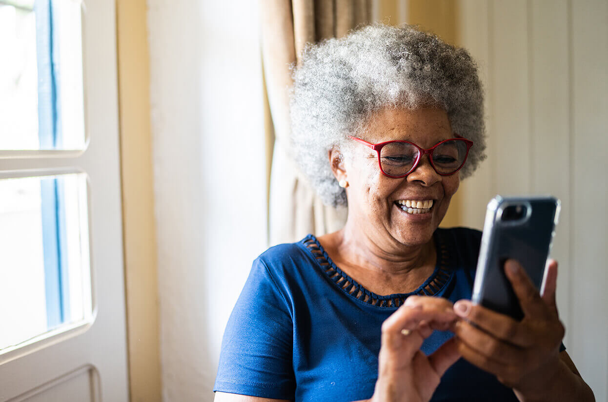 An older woman on her mobile phone