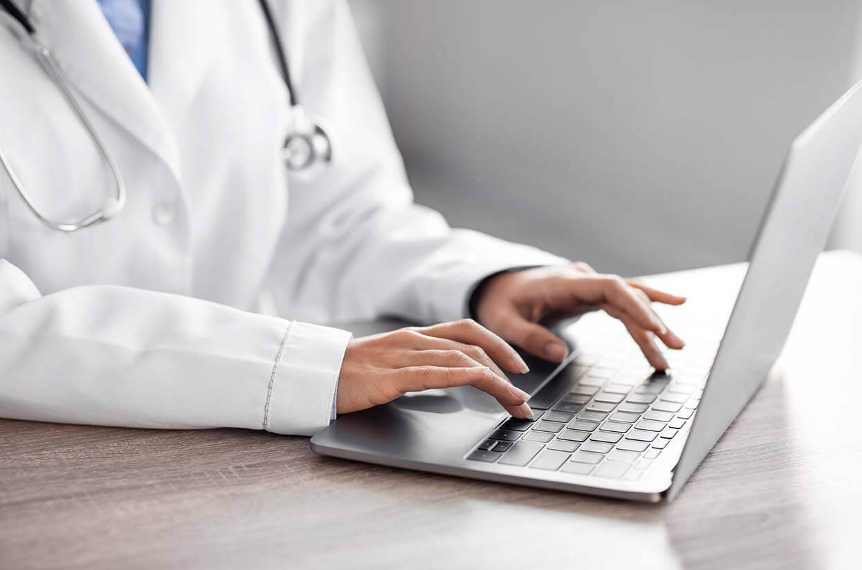 Medical practioner on a laptop