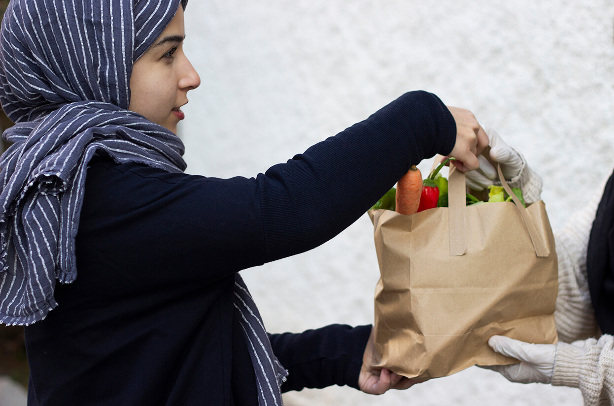 A woman delivering shopping