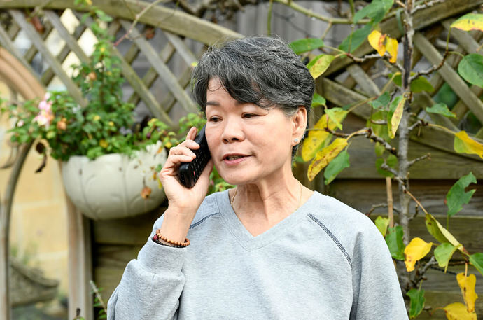 A Volunteer Responder having a telephone conversation